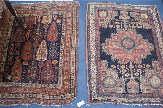 Two red and blue ground rugs, 120 x 90cm & 120 x 100cm